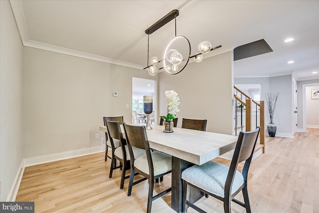 569 Riverside Dr, Princeton, NJ 08540 - dining space featuring ornamental molding, a chandelier, light wood-type flooring, stairway, and recessed lighting
