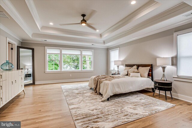 569 Riverside Dr, Princeton, NJ 08540 - bedroom featuring ornamental molding, a raised ceiling, light wood-style flooring, and recessed lighting