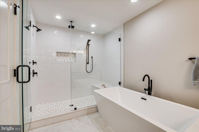 569 Riverside Dr, Princeton, NJ 08540 - full bath with a freestanding tub, a stall shower, recessed lighting, and marble finish floors