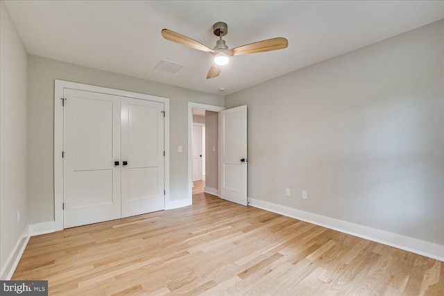 569 Riverside Dr, Princeton, NJ 08540 - unfurnished bedroom with light wood-style floors, a closet, and a ceiling fan