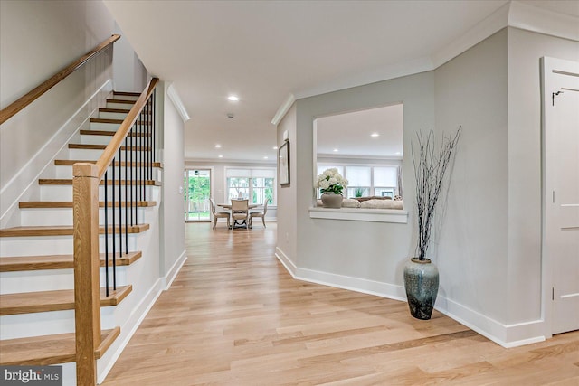 569 Riverside Dr, Princeton, NJ 08540 - hallway featuring light wood-style flooring, stairway, recessed lighting, and crown molding