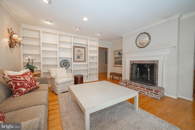 431 Waynesbrooke Rd, Berwyn, PA 19312 - living room featuring ornamental molding, light wood-type flooring, a fireplace, and recessed lighting