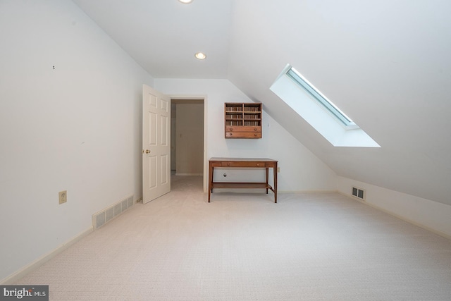 431 Waynesbrooke Rd, Berwyn, PA 19312 - additional living space featuring a skylight, vaulted ceiling, recessed lighting, and light colored carpet
