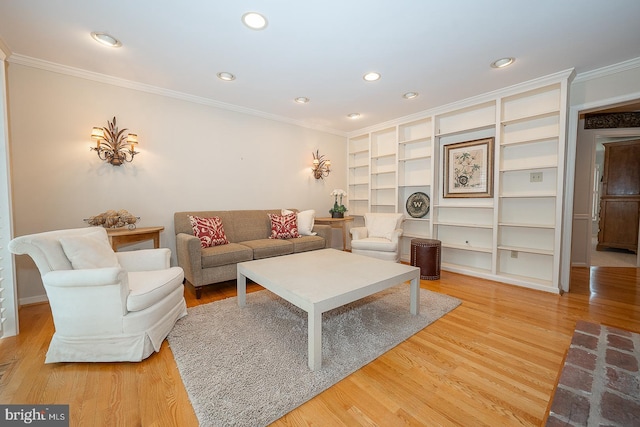 431 Waynesbrooke Rd, Berwyn, PA 19312 - living area featuring crown molding, light wood-style floors, recessed lighting, and built in shelves