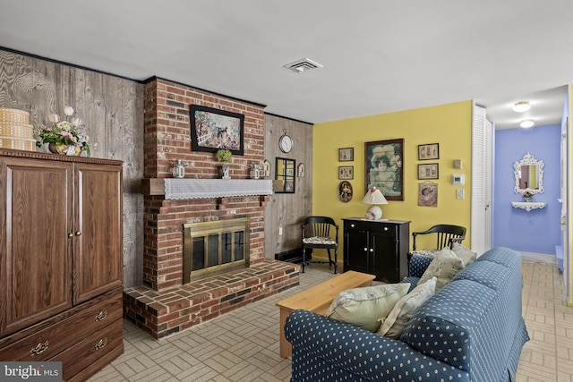 59 Saint Davids Pl, Southampton, NJ 08088 - living area with brick patterned floors and a fireplace