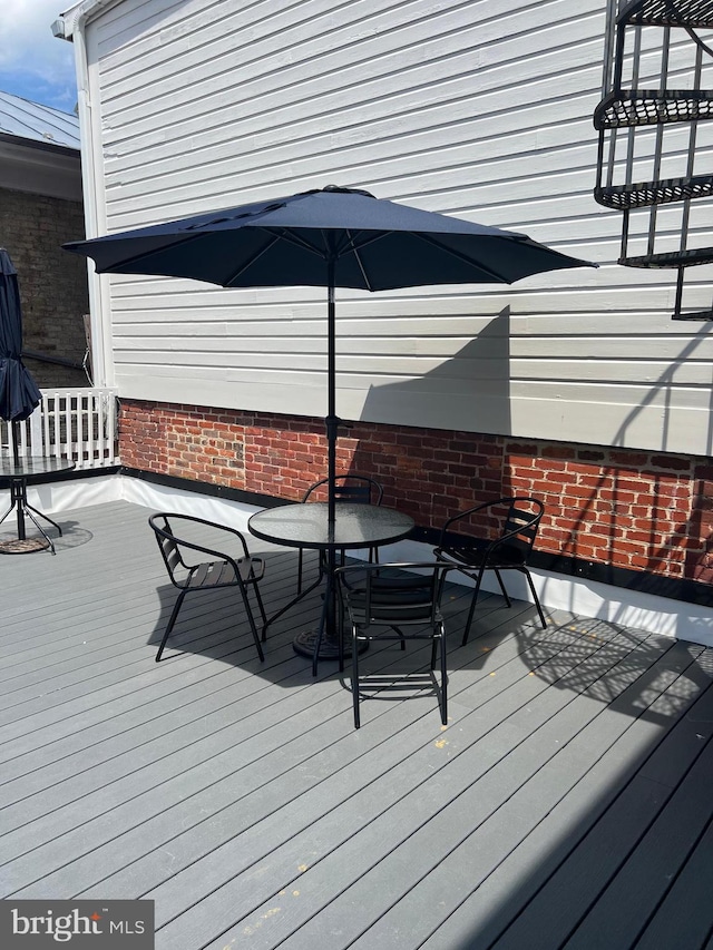 23 E Beverley St, Staunton, VA 24401 - wooden terrace featuring outdoor dining area