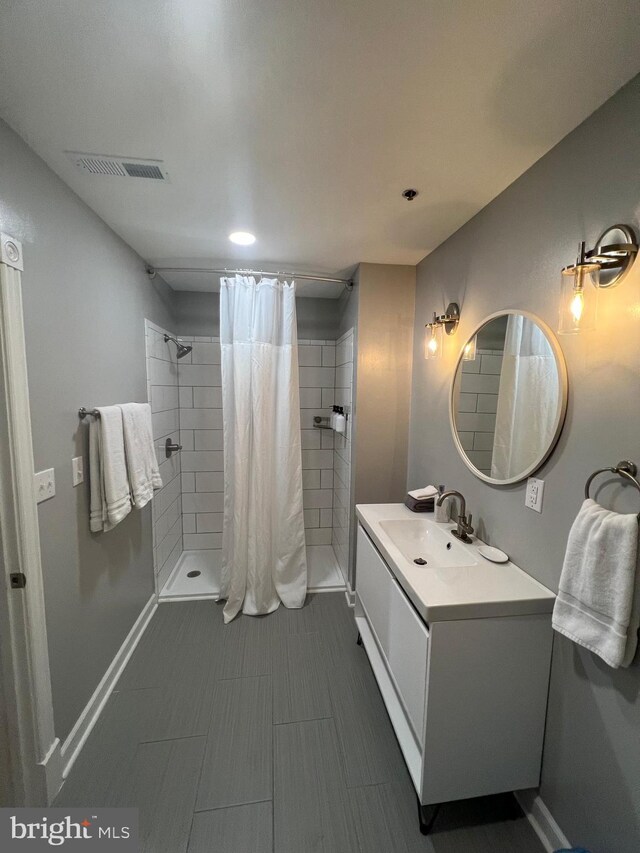 23 E Beverley St, Staunton, VA 24401 - full bath featuring vanity, a shower stall, and recessed lighting