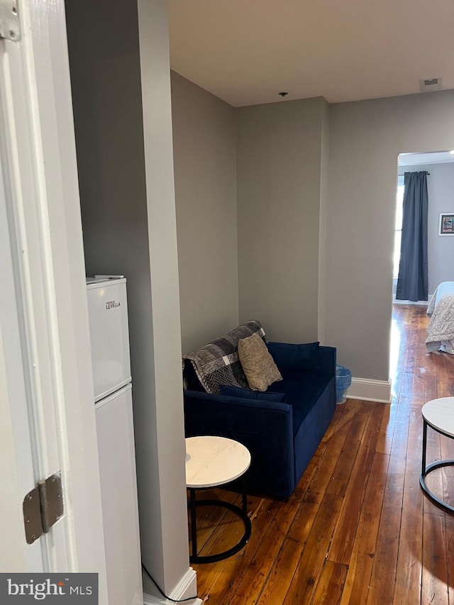 23 E Beverley St, Staunton, VA 24401 - sitting room featuring wood-type flooring and baseboards