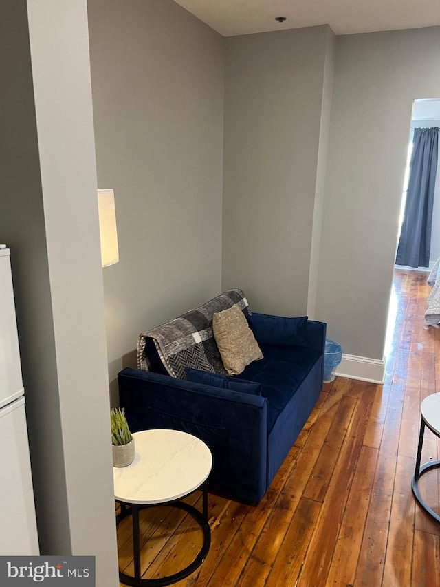 23 E Beverley St, Staunton, VA 24401 - living area with wood-type flooring and baseboards