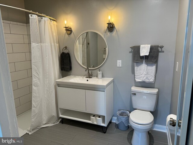 23 E Beverley St, Staunton, VA 24401 - bathroom with vanity, a shower with shower curtain, and tile patterned floors