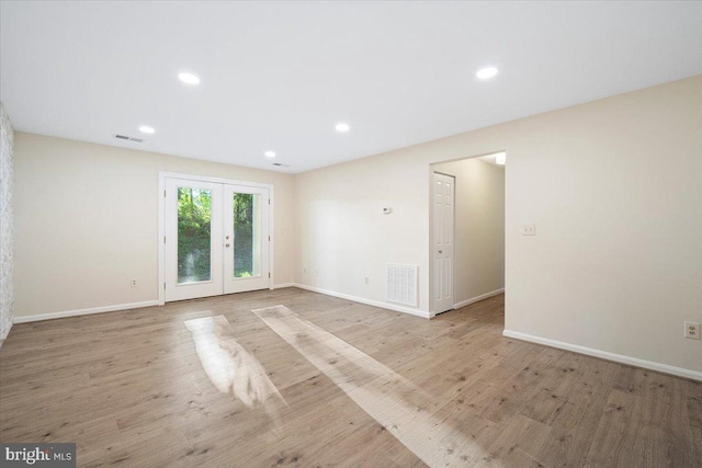 10264 Redtail Ct Unit 10264A, New Market, MD 21774 - empty room with light wood-type flooring, recessed lighting, and french doors