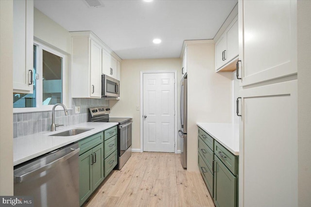 10264 Redtail Ct Unit 10264A, New Market, MD 21774 - kitchen with green cabinets, stainless steel appliances, light wood-type flooring, light countertops, and recessed lighting