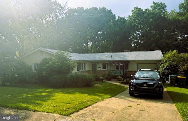 28 Worral Ct, Newark, DE 19711 - ranch-style house with an attached garage, a front lawn, and concrete driveway