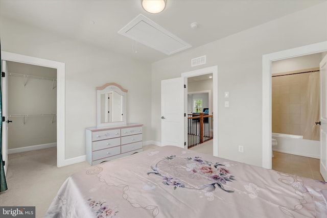 6071 Fallfish Ct, New Market, MD 21774 - bedroom with attic access, a spacious closet, connected bathroom, a closet, and carpet