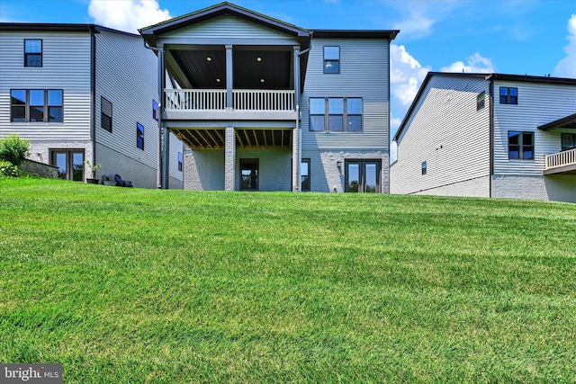 6071 Fallfish Ct, New Market, MD 21774 - rear view of house with french doors and a lawn