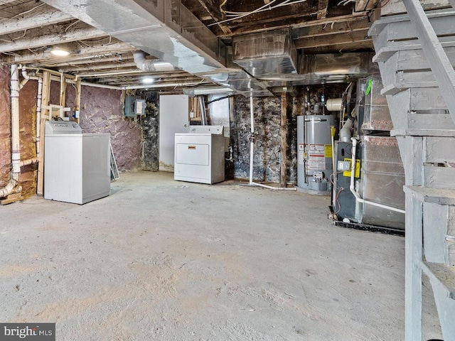 3402 Elmley Ave, Baltimore, MD 21213 - unfinished basement featuring gas water heater, washer and clothes dryer, and electric panel