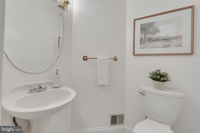 2153 Wolftrap Ct, Vienna, VA 22182 - half bathroom featuring toilet and a sink
