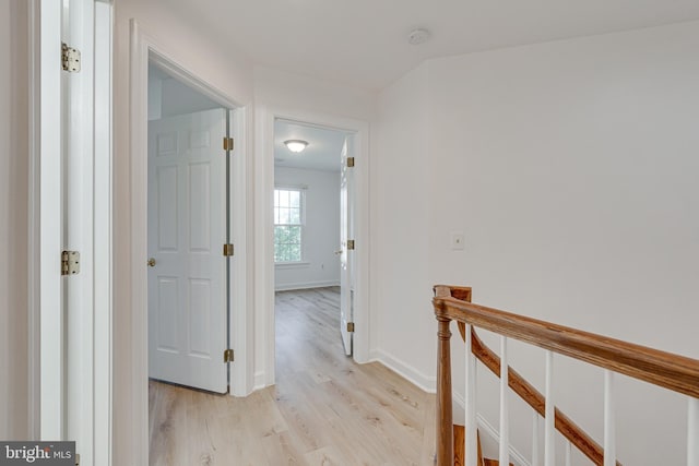 2153 Wolftrap Ct, Vienna, VA 22182 - hallway with an upstairs landing and light wood-type flooring