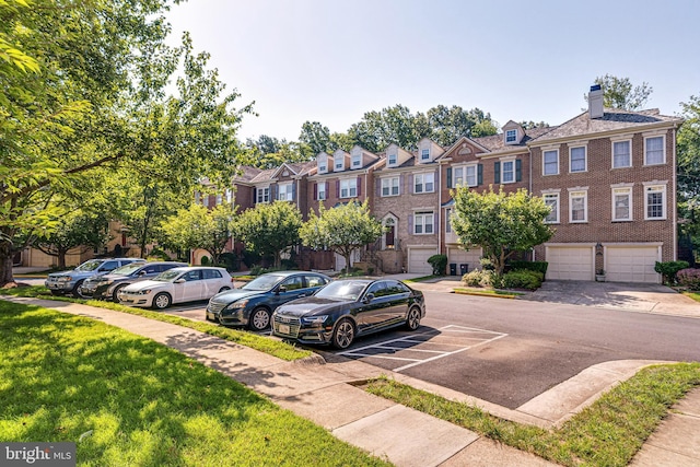 2153 Wolftrap Ct, Vienna, VA 22182 - uncovered parking lot with a residential view