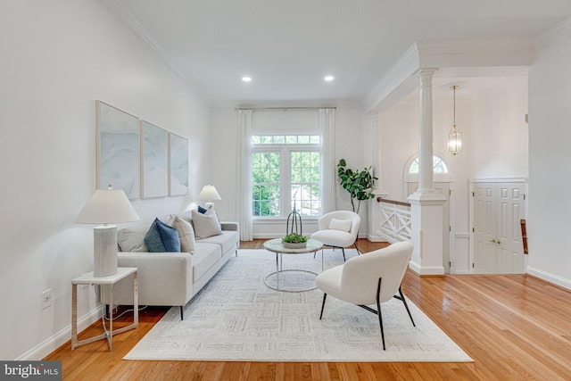2153 Wolftrap Ct, Vienna, VA 22182 - living room with ornamental molding, wood finished floors, decorative columns, and recessed lighting