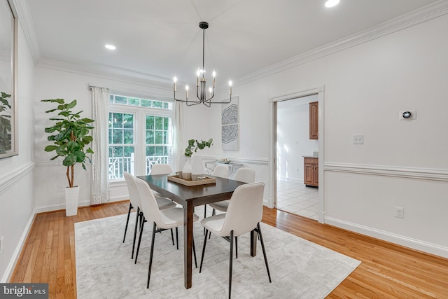 2153 Wolftrap Ct, Vienna, VA 22182 - dining room with a chandelier, light wood-type flooring, ornamental molding, and recessed lighting