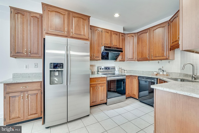 2153 Wolftrap Ct, Vienna, VA 22182 - kitchen with appliances with stainless steel finishes, range hood, light stone counters, decorative backsplash, and light tile patterned floors