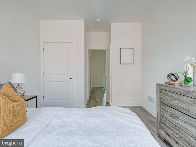 2103 E Cumberland St, Philadelphia, PA 19125 - bedroom featuring wood finished floors and baseboards