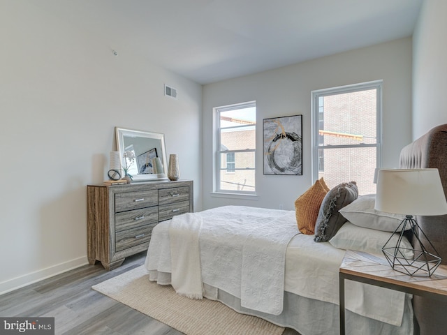 2103 E Cumberland St, Philadelphia, PA 19125 - bedroom featuring wood finished floors and baseboards