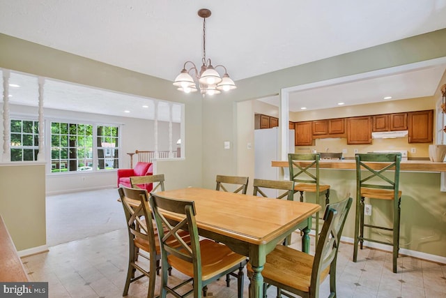 3077 Eutaw Forest Dr, Waldorf, MD 20603 - dining area with a chandelier, recessed lighting, and light colored carpet