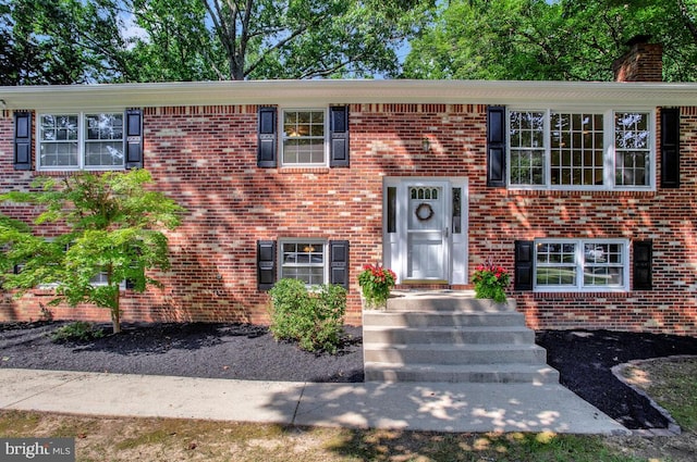 3077 Eutaw Forest Dr, Waldorf, MD 20603 - split foyer home with brick siding and a chimney