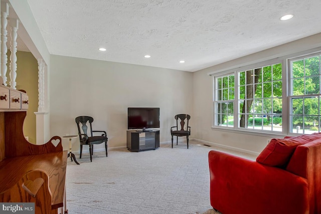 3077 Eutaw Forest Dr, Waldorf, MD 20603 - living area with carpet, a textured ceiling, and recessed lighting