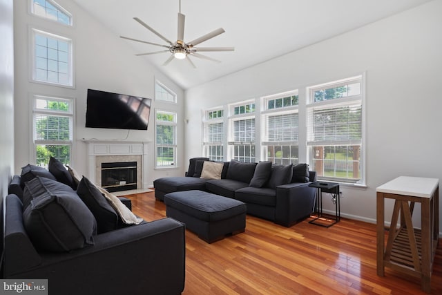 3960 Mountain View Ave, Easton, PA 18045 - living room featuring high vaulted ceiling, light wood finished floors, ceiling fan, and plenty of natural light