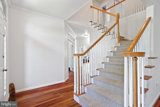 3960 Mountain View Ave, Easton, PA 18045 - foyer entrance with wood finished floors, crown molding, and stairs