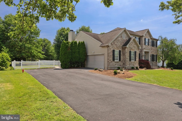 3960 Mountain View Ave, Easton, PA 18045 - view of front of property featuring driveway, stone siding, a garage, and a chimney