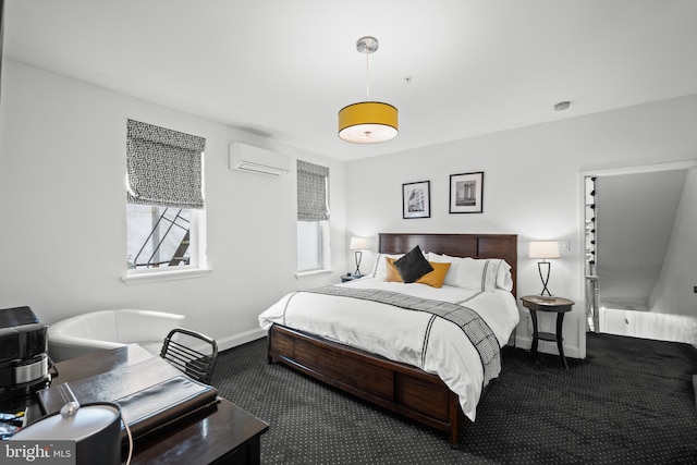 210 S High St, Baltimore, MD 21202 - carpeted bedroom with baseboards and a wall mounted AC