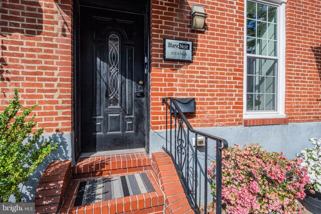 210 S High St, Baltimore, MD 21202 - view of exterior entry with brick siding