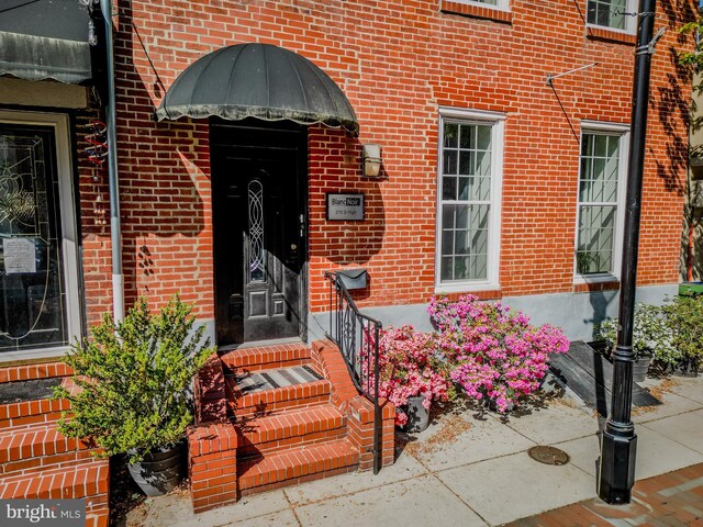 210 S High St, Baltimore, MD 21202 - view of exterior entry with brick siding