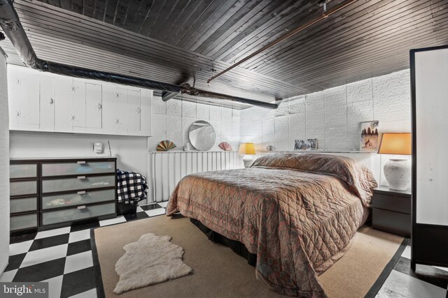 210 S High St, Baltimore, MD 21202 - bedroom with tile patterned floors and wooden ceiling