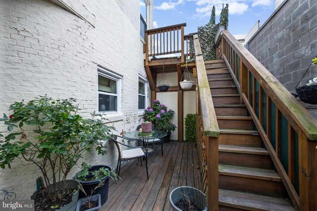 210 S High St, Baltimore, MD 21202 - wooden deck featuring stairway
