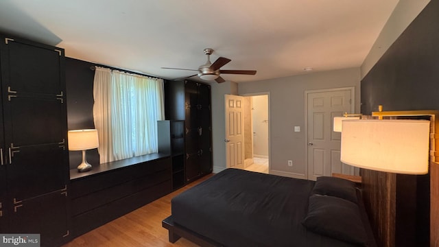 4309 Walther Ave, Baltimore, MD 21214 - bedroom featuring light wood finished floors and ceiling fan
