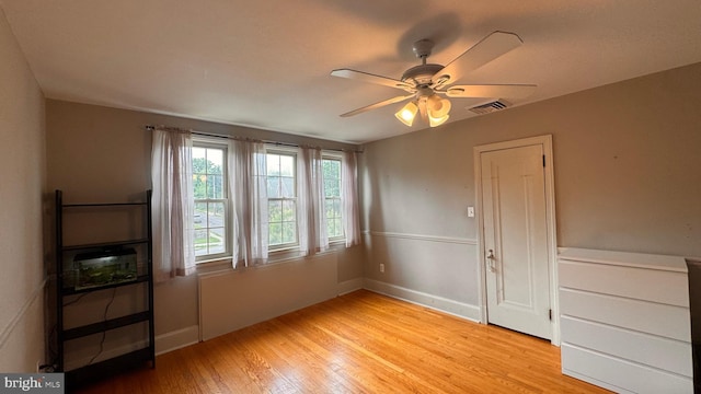 4309 Walther Ave, Baltimore, MD 21214 - empty room featuring light wood finished floors and ceiling fan