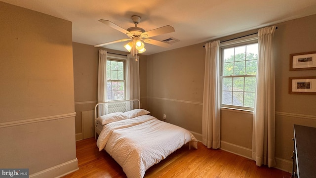 4309 Walther Ave, Baltimore, MD 21214 - bedroom featuring wood finished floors and ceiling fan