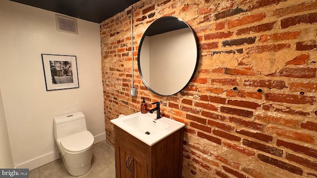 4309 Walther Ave, Baltimore, MD 21214 - half bathroom featuring vanity and brick wall