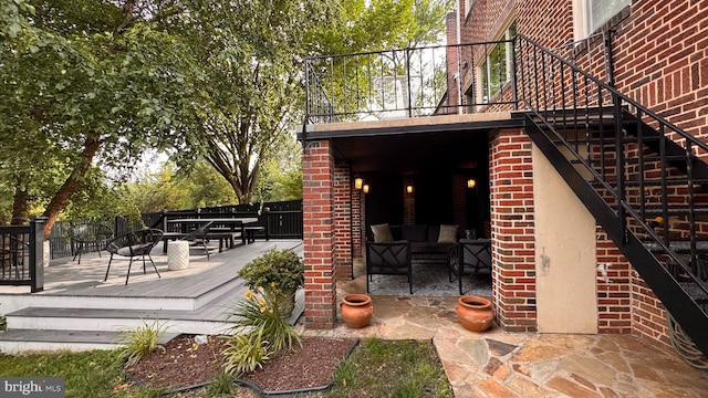 4309 Walther Ave, Baltimore, MD 21214 - view of patio / terrace with a deck, outdoor dining space, and stairway
