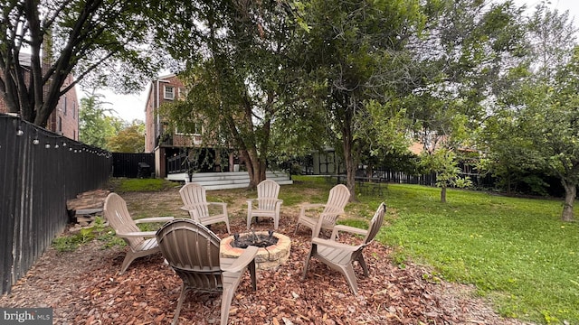4309 Walther Ave, Baltimore, MD 21214 - fenced backyard with a fire pit