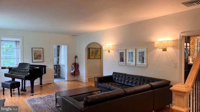 4309 Walther Ave, Baltimore, MD 21214 - living room with light wood-style floors and stairs