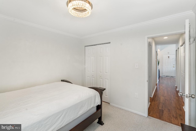7823 Harrowgate Cir Unit D, Springfield, VA 22152 - bedroom with ornamental molding, a closet, and a chandelier