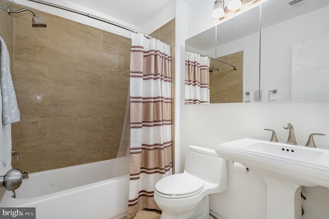 7823 Harrowgate Cir Unit D, Springfield, VA 22152 - full bathroom featuring shower / bath combination with curtain and toilet