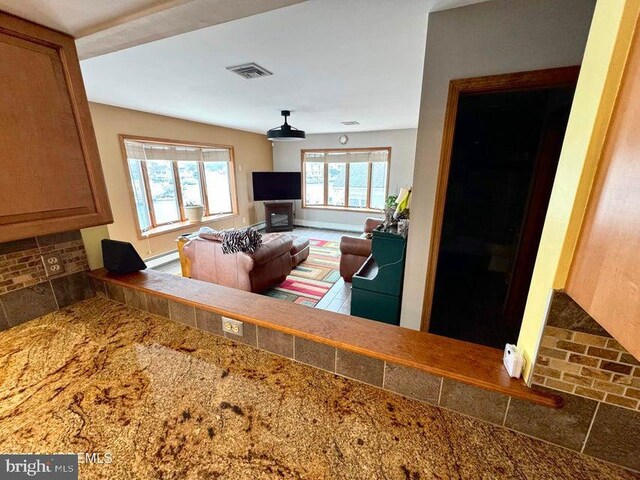953 Capstan Dr, Forked River, NJ 08731 - living room with baseboard heating and baseboards