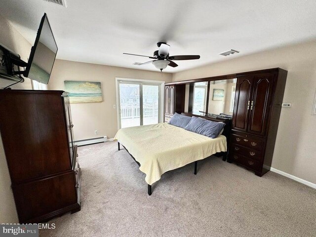 953 Capstan Dr, Forked River, NJ 08731 - bedroom with a baseboard radiator, access to outside, light carpet, and a ceiling fan